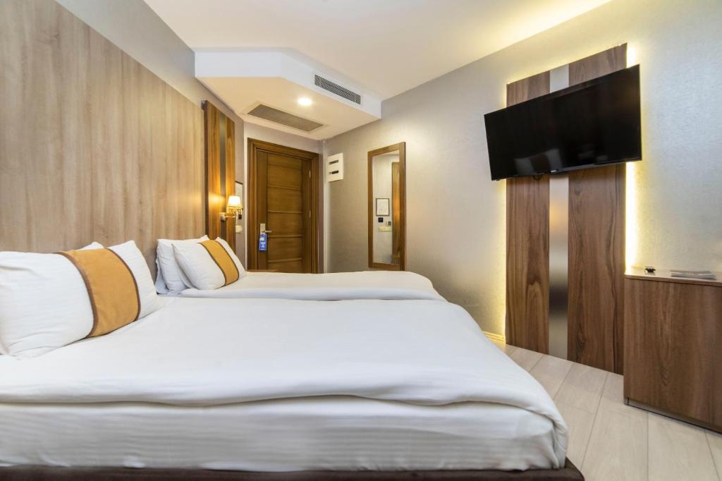 Royal Capital Hotel Bursaにあるベッド