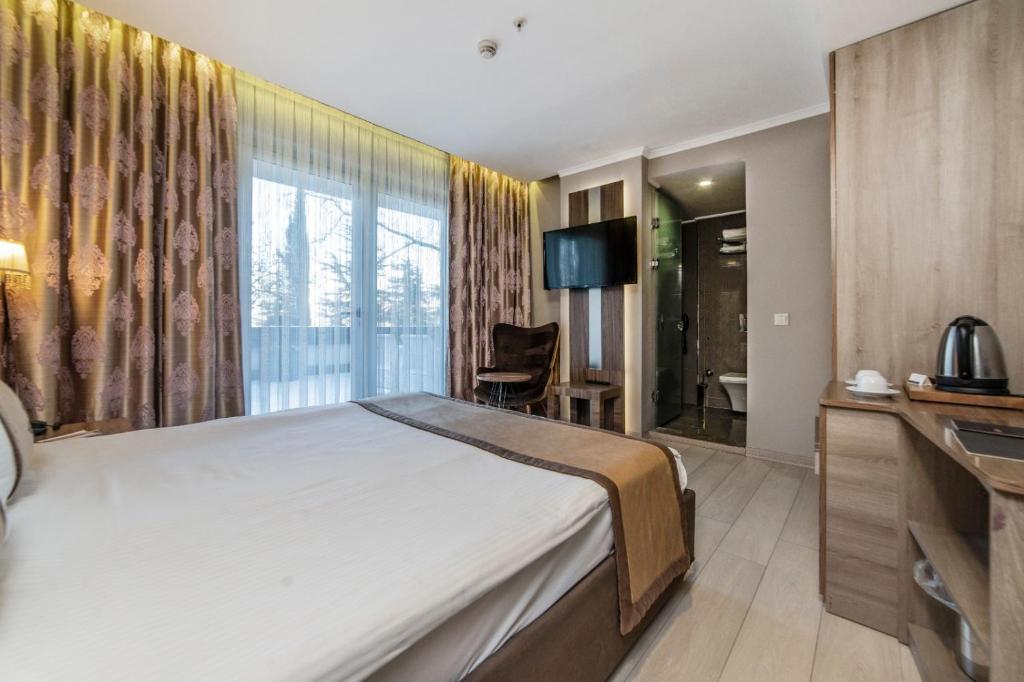 Royal Capital Hotel Bursaにあるベッド