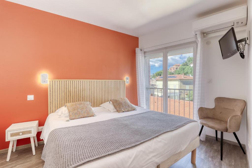 Postel nebo postele na pokoji v ubytování Anglade Hotel