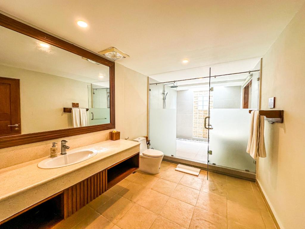Koupelna v ubytování Ghana Villa Seminyak by Pramana Villas
