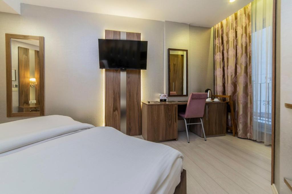 Royal Capital Hotel Bursaにあるベッド