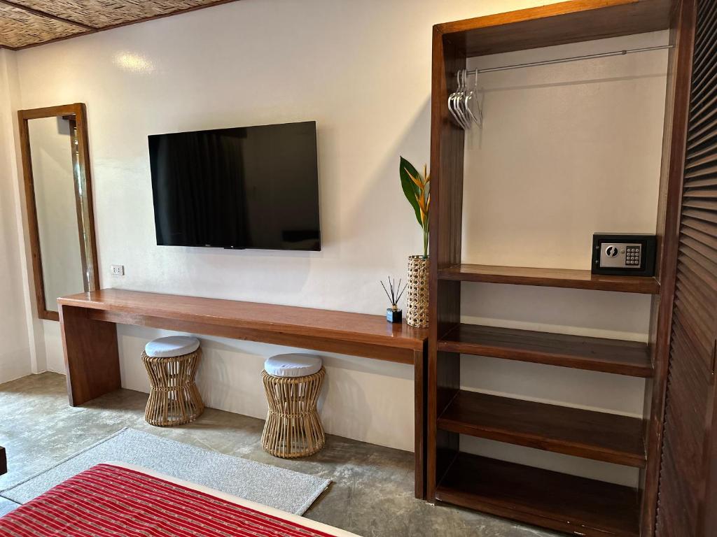 TV a/nebo společenská místnost v ubytování Yumi Villas