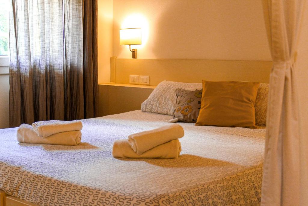 Posteľ alebo postele v izbe v ubytovaní BeeHouse - La Casa delle Api Agriturismo