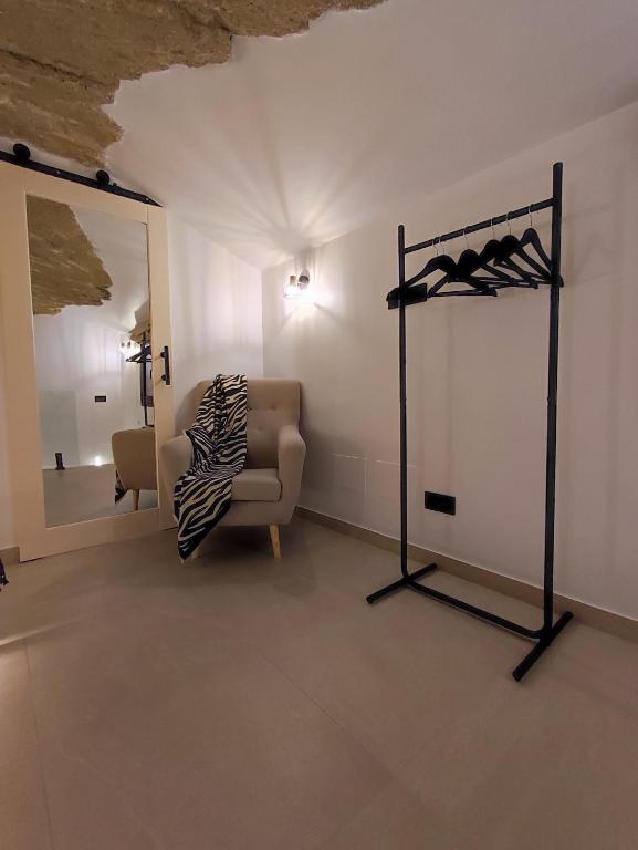 Postel nebo postele na pokoji v ubytování Casa Cueva Un Rinconcito en Setenil