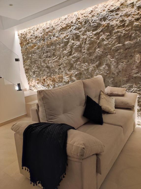 Posezení v ubytování Casa Cueva Un Rinconcito en Setenil