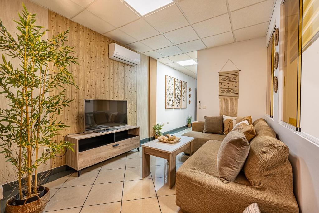Televízia a/alebo spoločenská miestnosť v ubytovaní Apartamento El Dorado cerca del mar