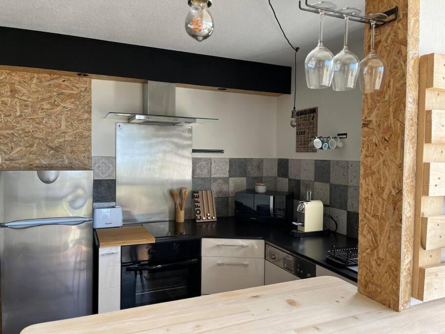 Η κουζίνα ή μικρή κουζίνα στο Appartement Cosy, vue Mer