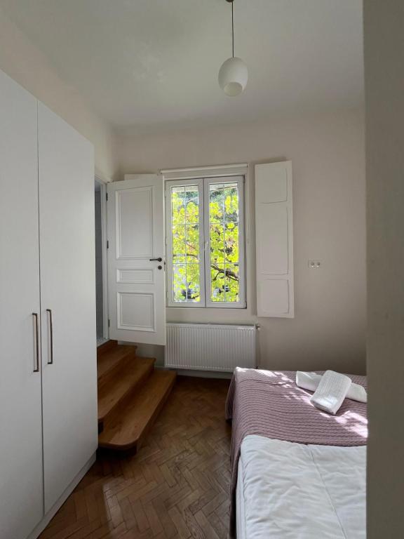 Postel nebo postele na pokoji v ubytování Hotel Loft
