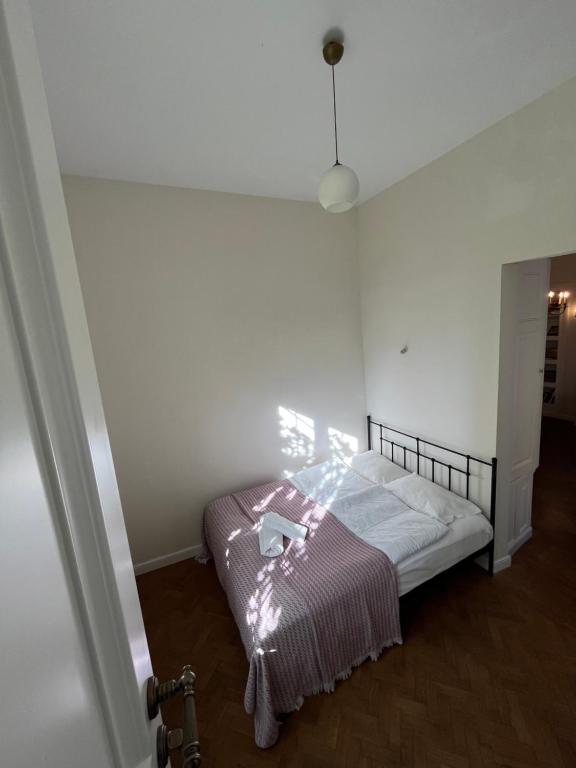 Postel nebo postele na pokoji v ubytování Hotel Loft