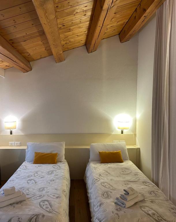 Posteľ alebo postele v izbe v ubytovaní BeeHouse - La Casa delle Api Agriturismo