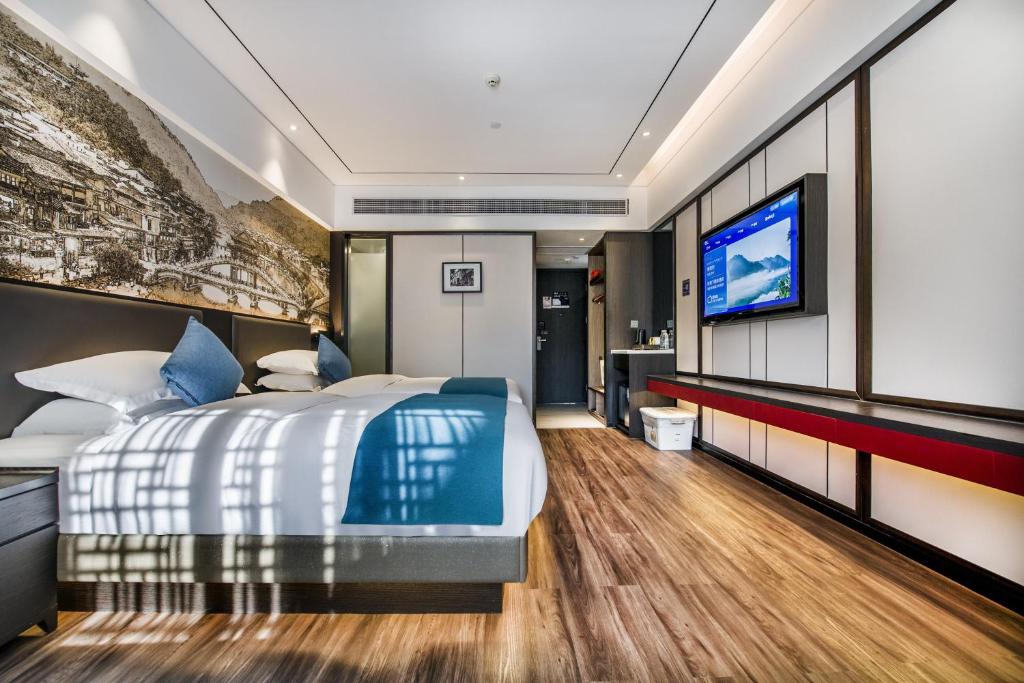 和沐嘉江岸星河酒店-凤凰古城虹桥中路店Jiang'an Xinghe Hotel - Habitación Doble Deluxe