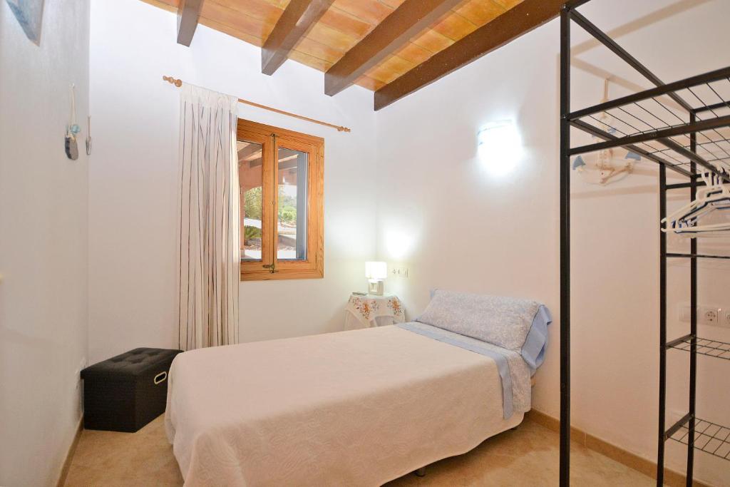 A bed or beds in a room at Villa Victori