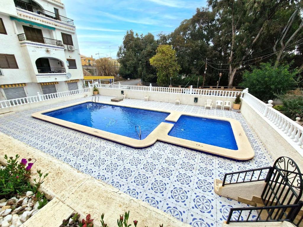 Bazén v ubytování Residential with pool, 500 meters to the beach nebo v jeho okolí