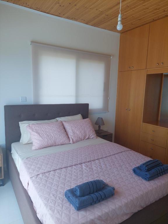 Postel nebo postele na pokoji v ubytování Villa Georgia