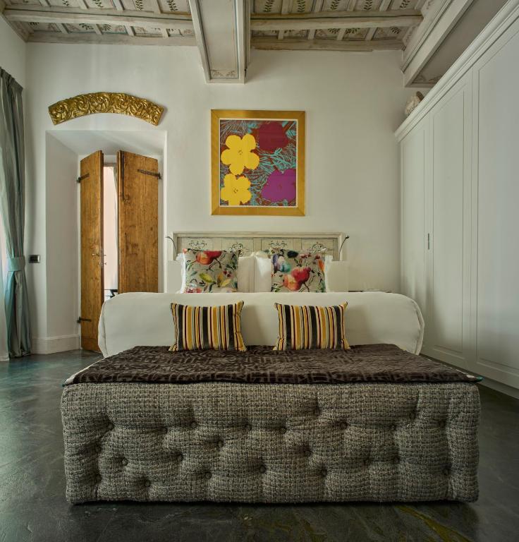 A seating area at Palazzo Delle Pietre - Luxury Apartments