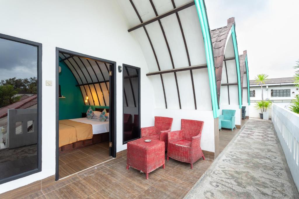 Balkón nebo terasa v ubytování Kidi's Lodge Gilitrawangan