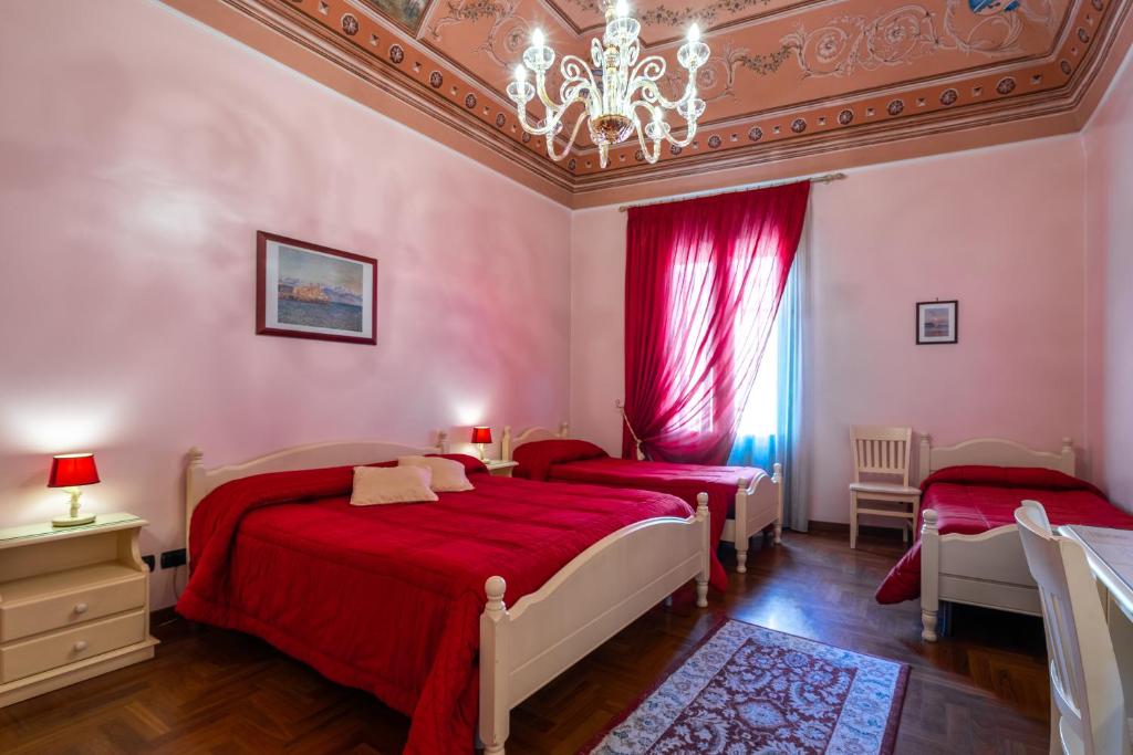 Posteľ alebo postele v izbe v ubytovaní ALHAMBRA - Guest House di Charme