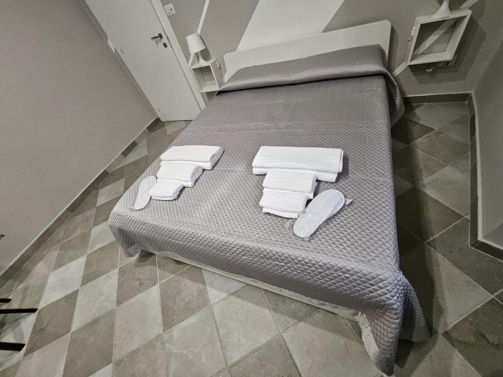 Postel nebo postele na pokoji v ubytování Le Stanze di Giulia