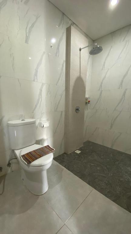 Koupelna v ubytování Sandat Hotel Legian