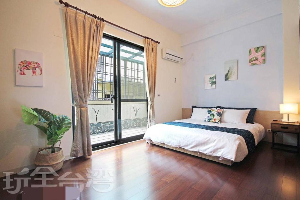 Postel nebo postele na pokoji v ubytování Dibao 16 Homestay