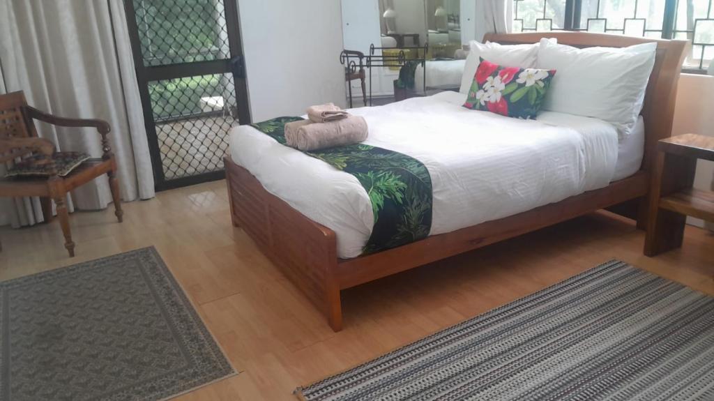 Postel nebo postele na pokoji v ubytování Residence71Nadi Fiji