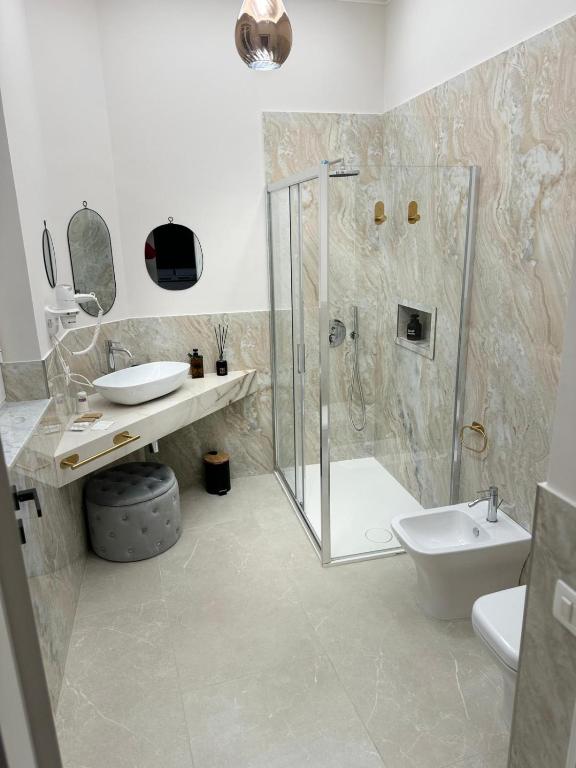 Koupelna v ubytování InCentro Elegant Rooms
