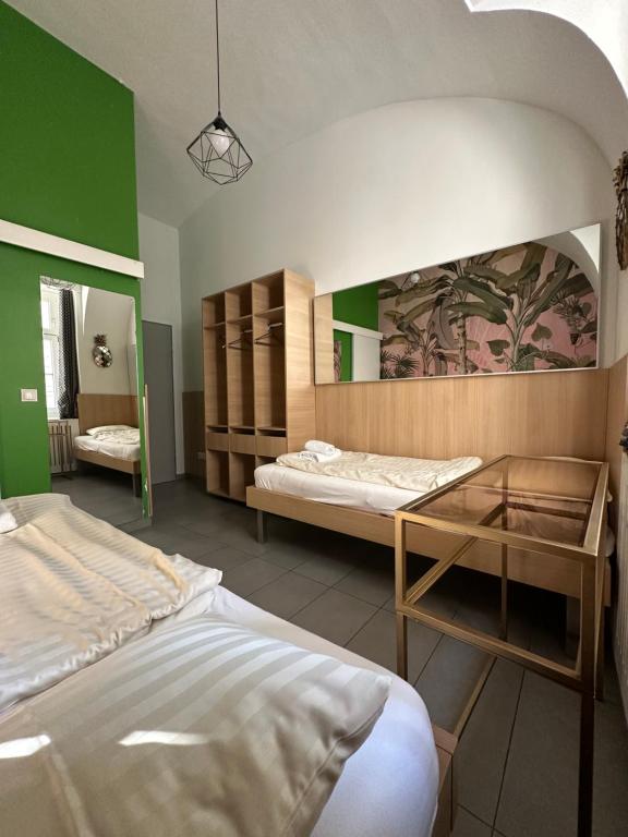 Postel nebo postele na pokoji v ubytování HousingPlus