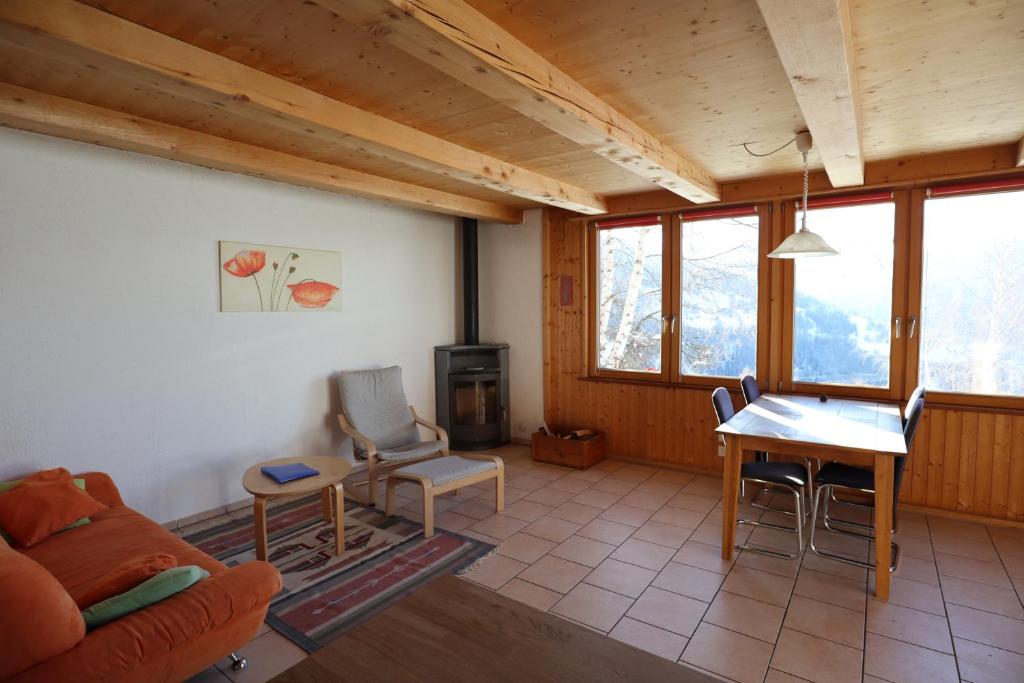 Posezení v ubytování Chalet Les Pyramides