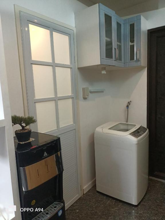 Kuchyň nebo kuchyňský kout v ubytování One Oasis Davao Condo 2BR Behind SM Mall with WIFI & Pool