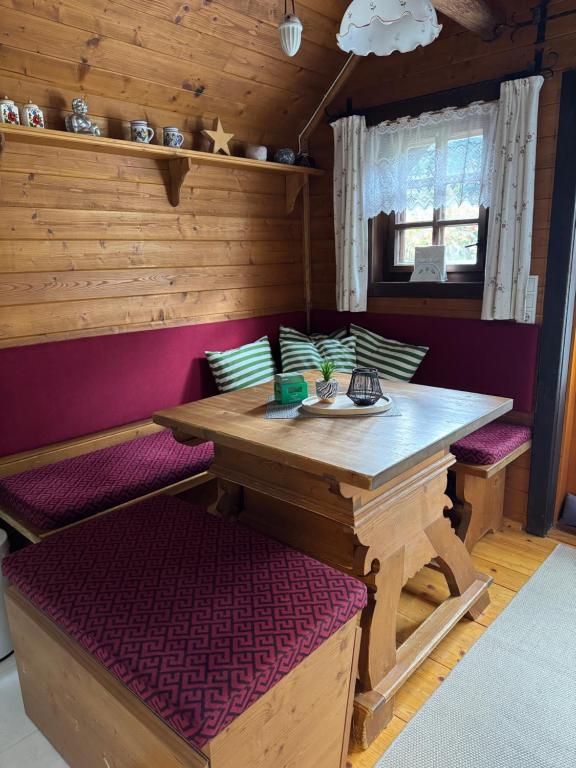 Posezení v ubytování Ferienhaus Fischerhütte Rassis Feriendorf Donnersbachwald