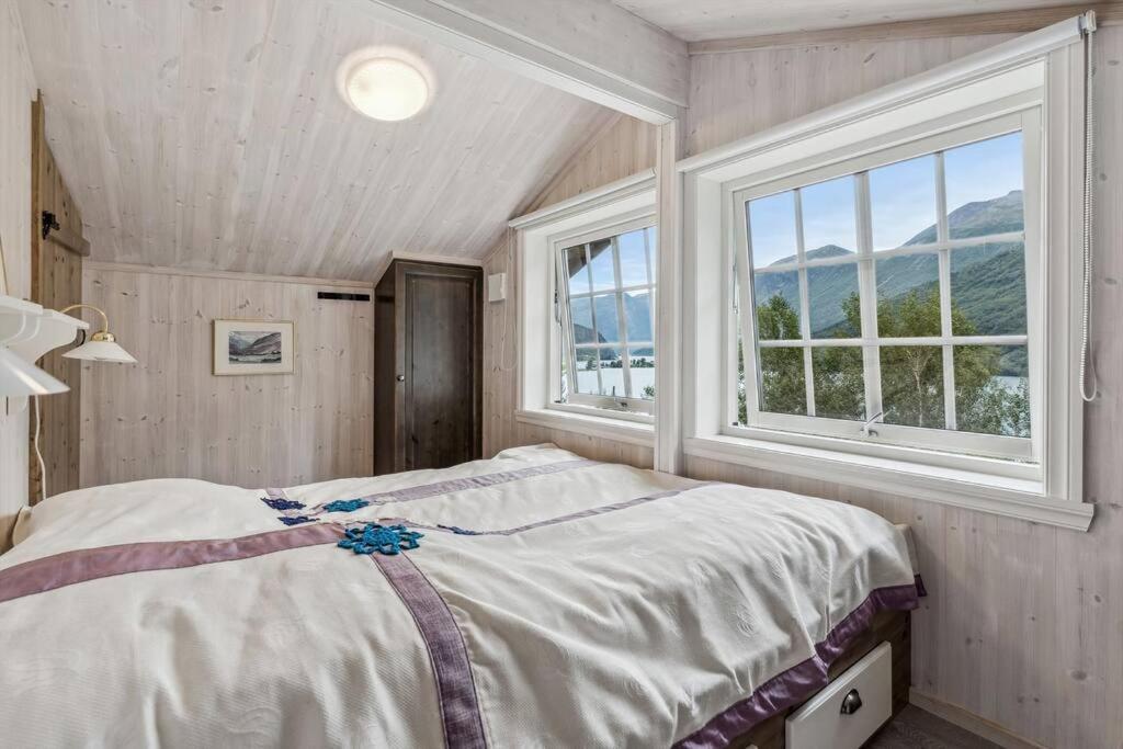 Ένα ή περισσότερα κρεβάτια σε δωμάτιο στο Tenna 48 Panorama