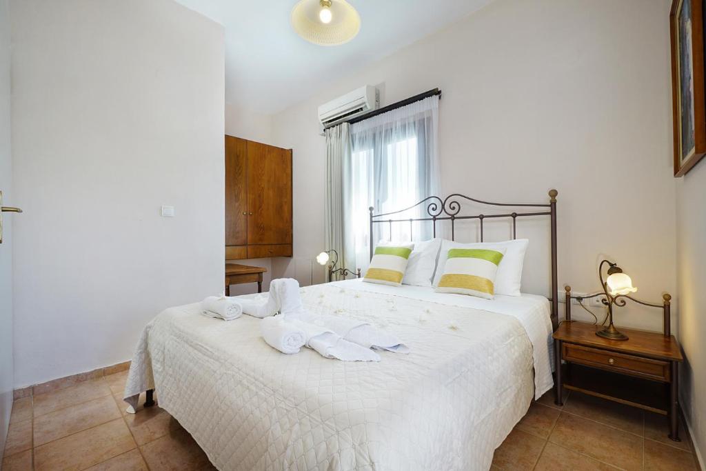 Postel nebo postele na pokoji v ubytování Villa Melini
