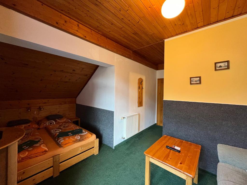 Postel nebo postele na pokoji v ubytování Pension Jitka