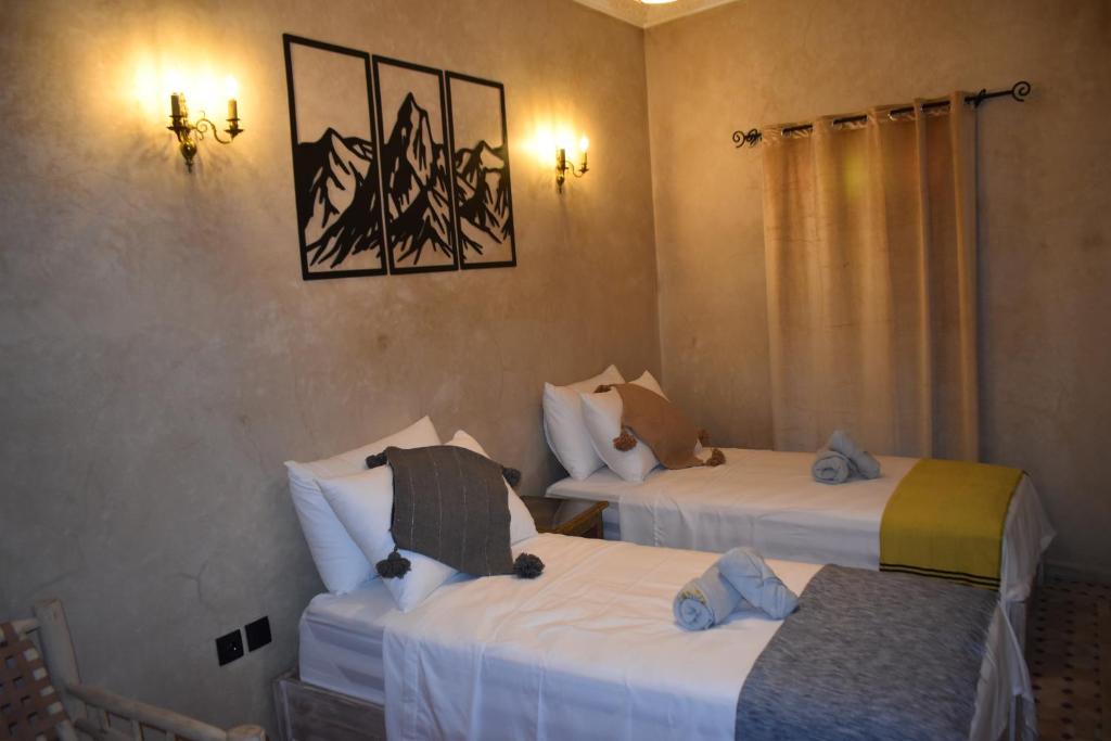 Postel nebo postele na pokoji v ubytování Riad Mogantique-Essaouira