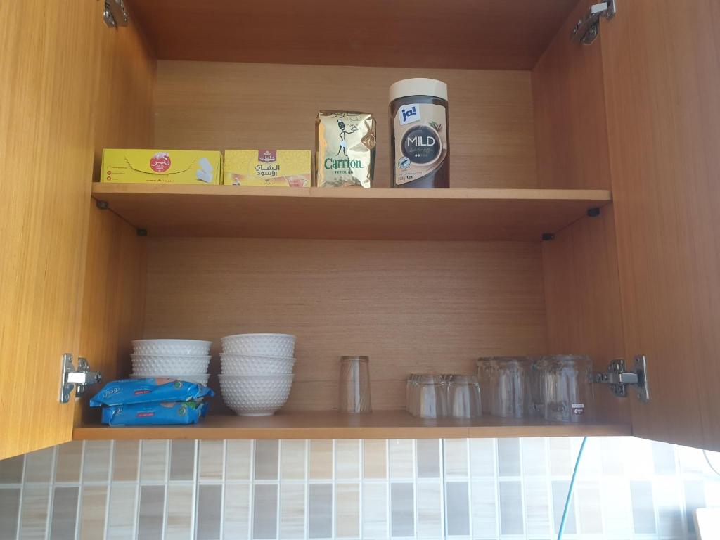 Kuchyň nebo kuchyňský kout v ubytování Doha Apartment