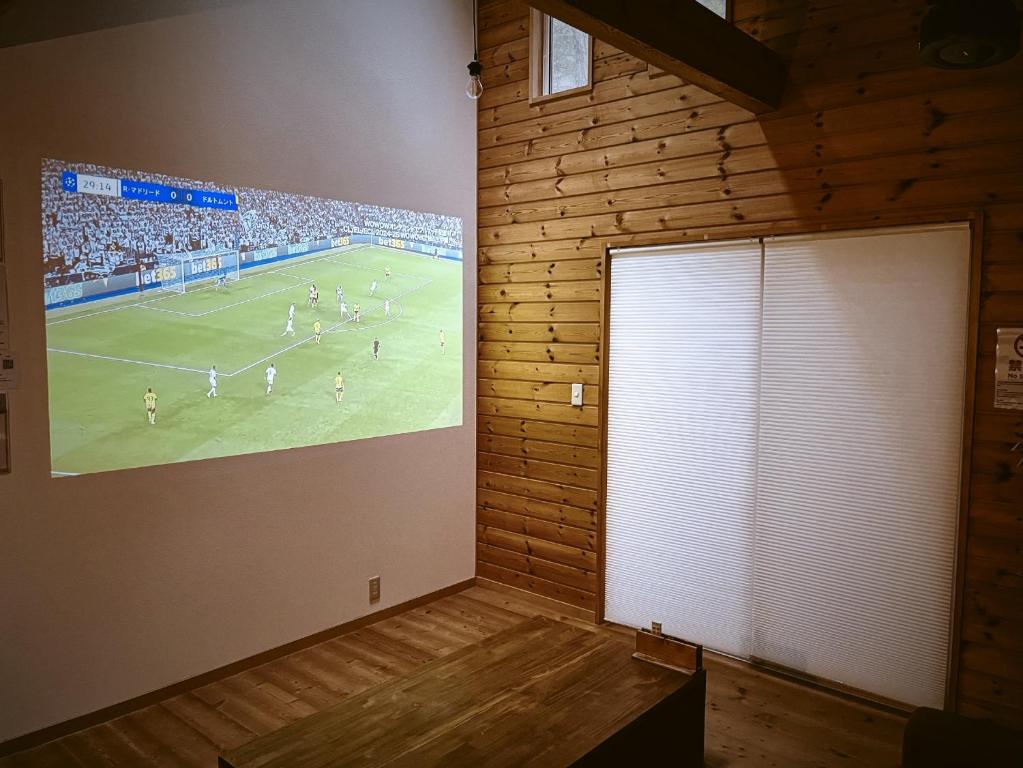 TV a/nebo společenská místnost v ubytování モリテラス凛 -北軽井沢-