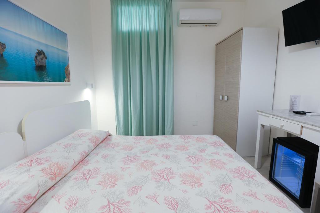 Telewizja i/lub zestaw kina domowego w obiekcie Hotel Approdo di Venere