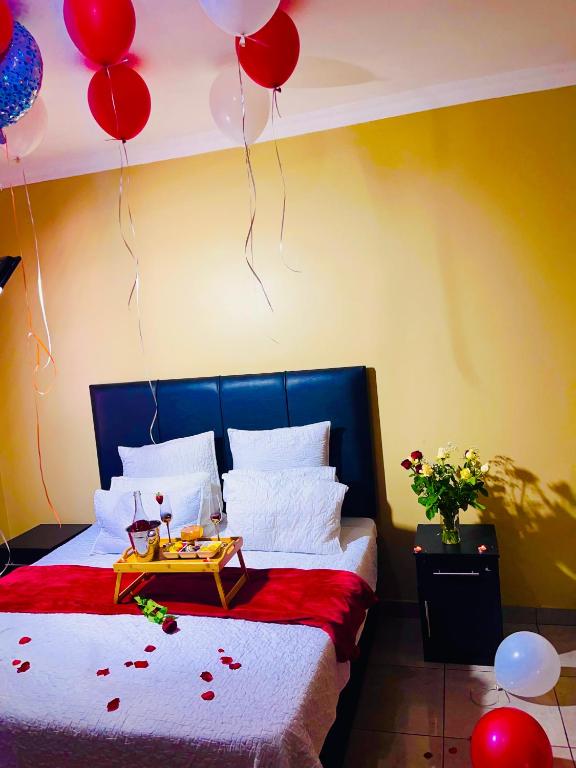 Ένα ή περισσότερα κρεβάτια σε δωμάτιο στο Executive Guesthouse