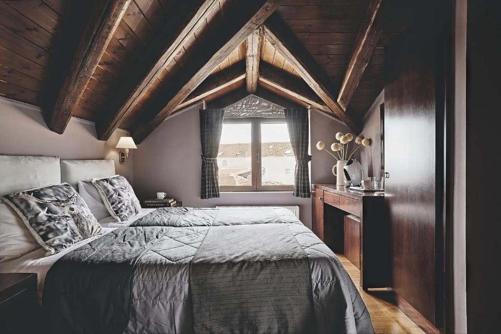 Postel nebo postele na pokoji v ubytování Mons Arachova