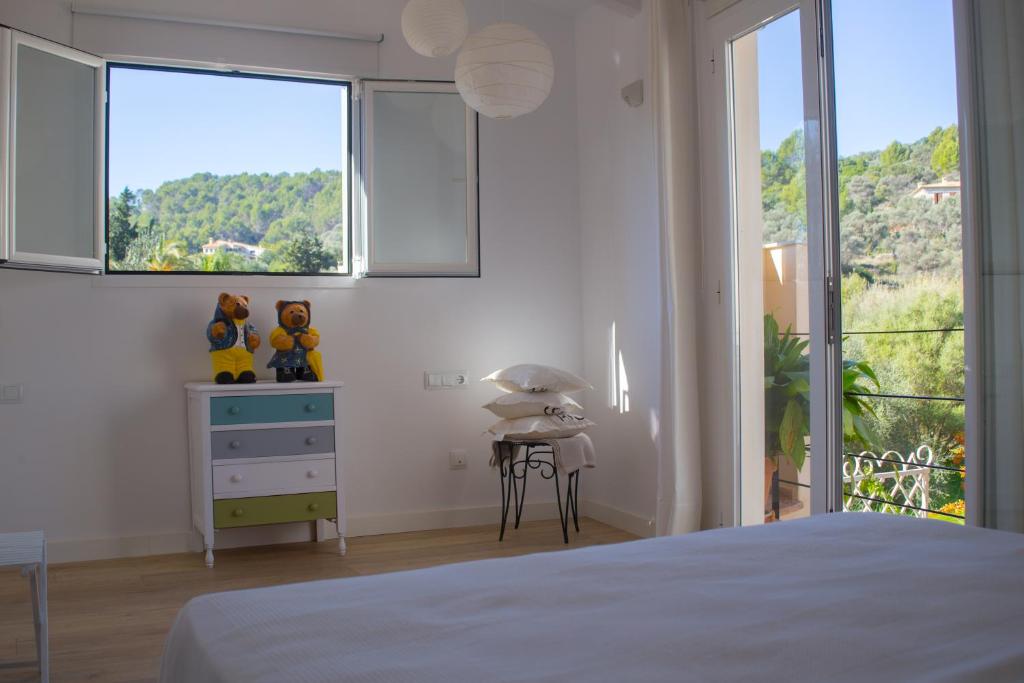 A bed or beds in a room at Casa Gema