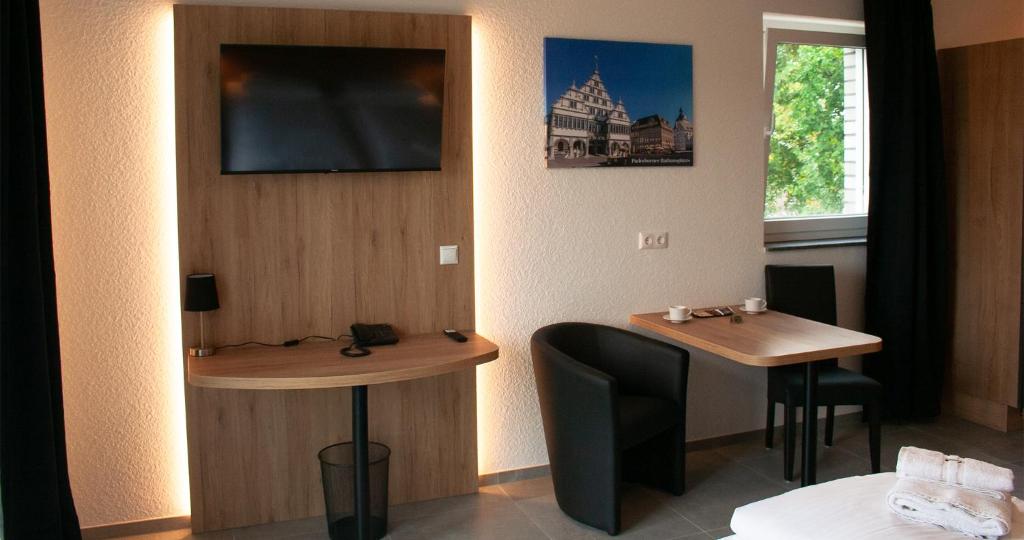 TV a/nebo společenská místnost v ubytování Hotel Good Night