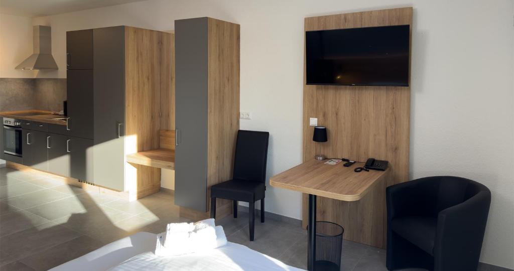 TV a/nebo společenská místnost v ubytování Hotel Good Night