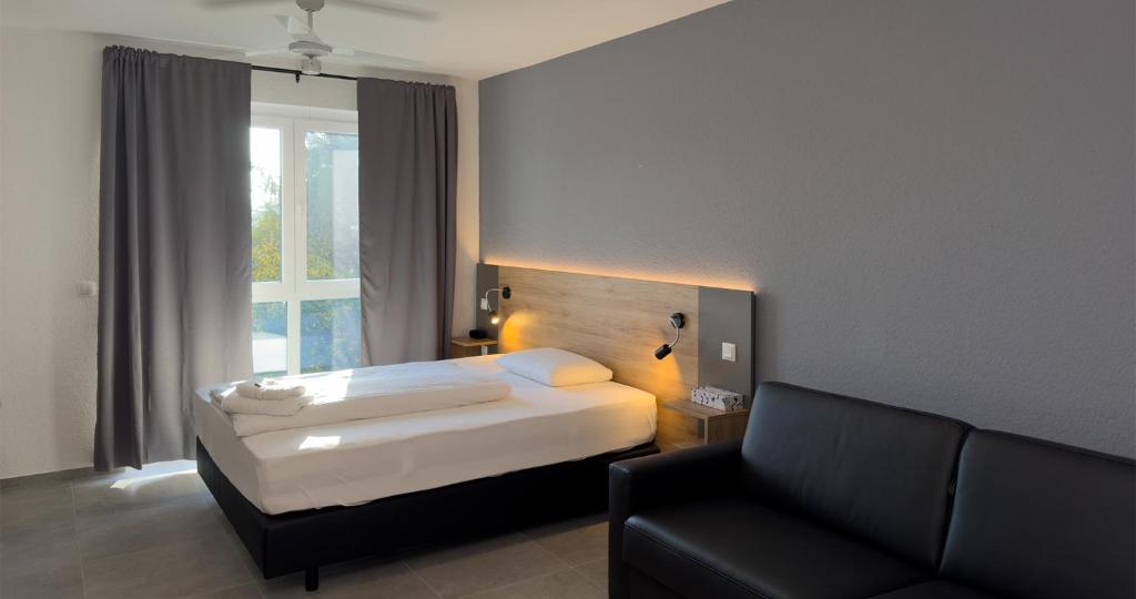 Postel nebo postele na pokoji v ubytování Hotel Good Night