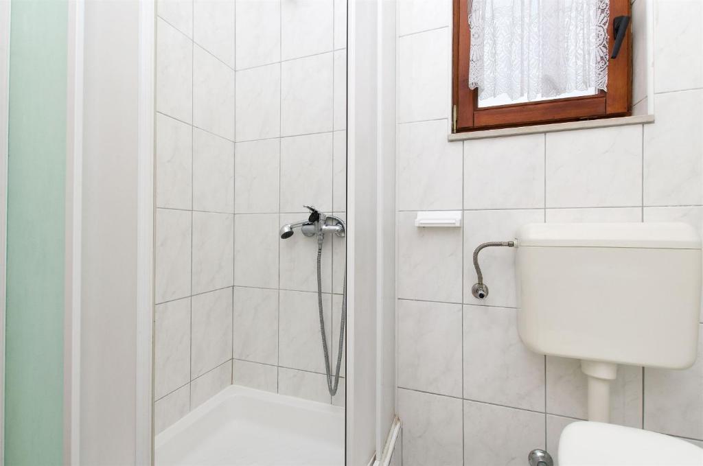 Kúpeľňa v ubytovaní Apartments Neva