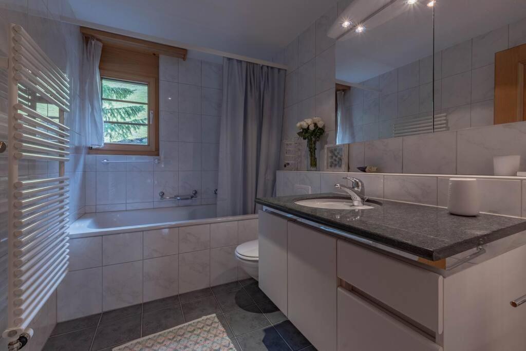 Koupelna v ubytování Wohnung Homely - Nähe Grindelwald Terminal