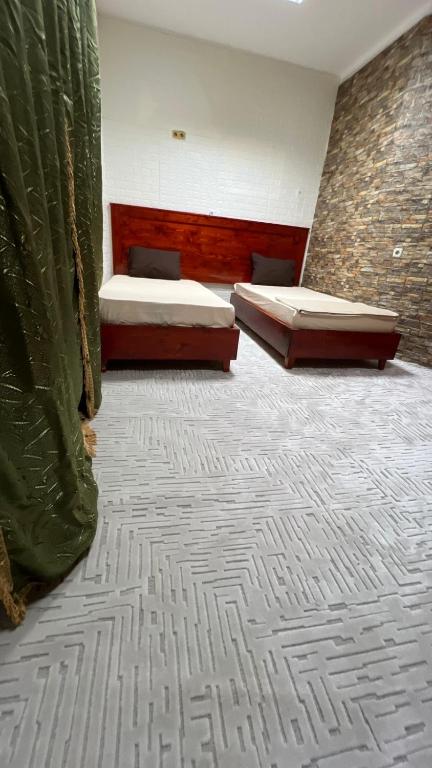 Postel nebo postele na pokoji v ubytování Pensione Dahab