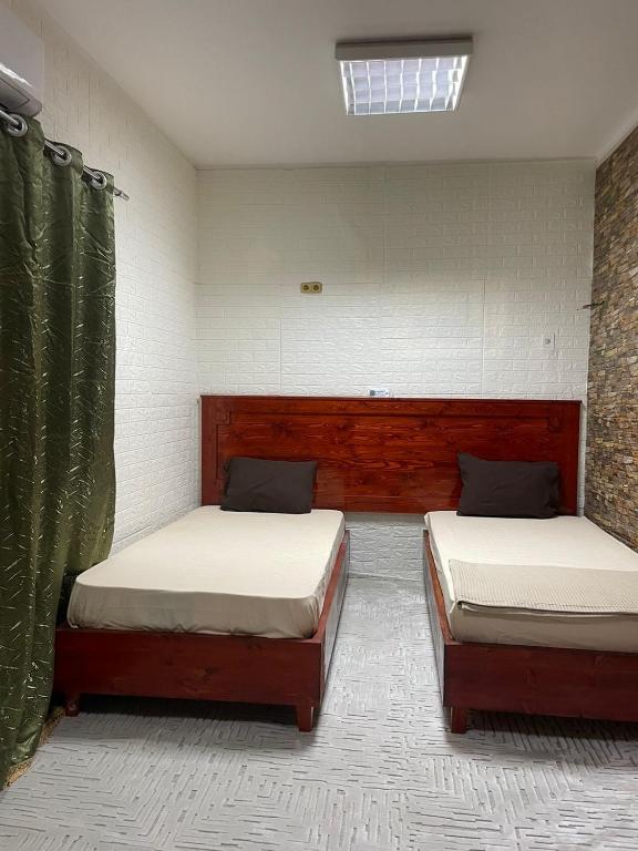 Postel nebo postele na pokoji v ubytování Pensione Dahab