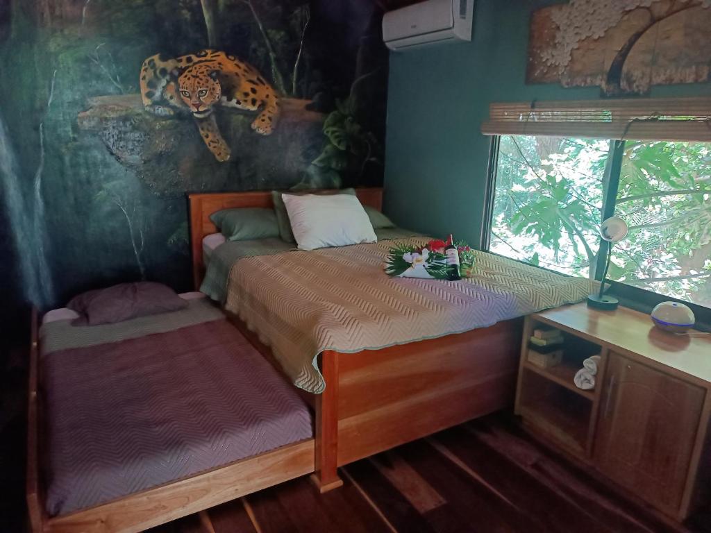 Postel nebo postele na pokoji v ubytování El Valle Mineral Springs