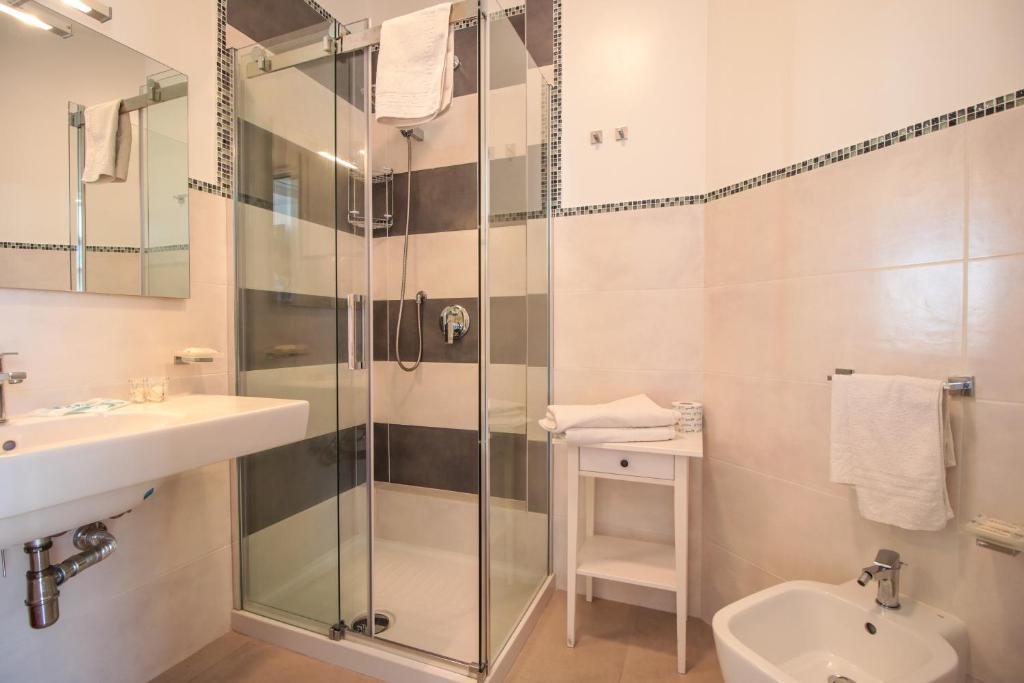 Kúpeľňa v ubytovaní Hotel Il Faro Della Guitgia Tommasino