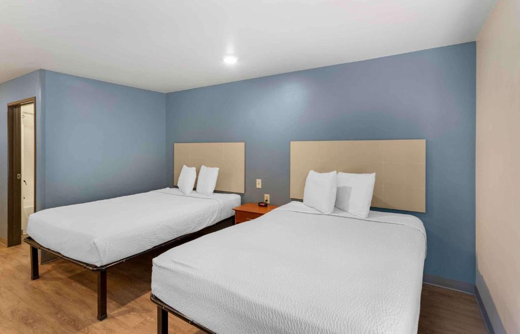 Postel nebo postele na pokoji v ubytování Extended Stay America Select Suites - Austin - Round Rock